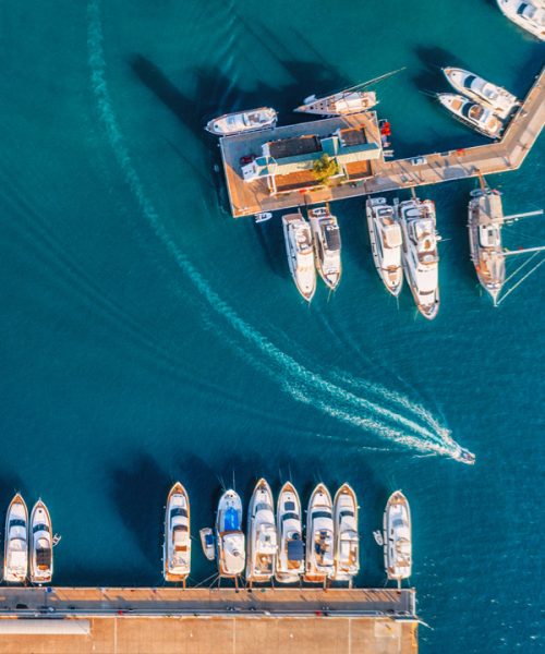 aerial-view-of-amazing-boats-at-sunset-minimalist-2023-11-27-05-08-14-utc